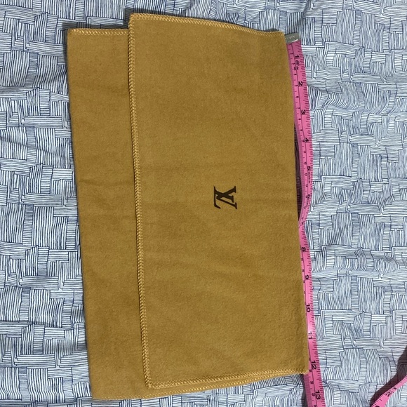 Lv dustbag good used condition clean in and out 12x 7 in inches no foul smell - Picture 1 of 3